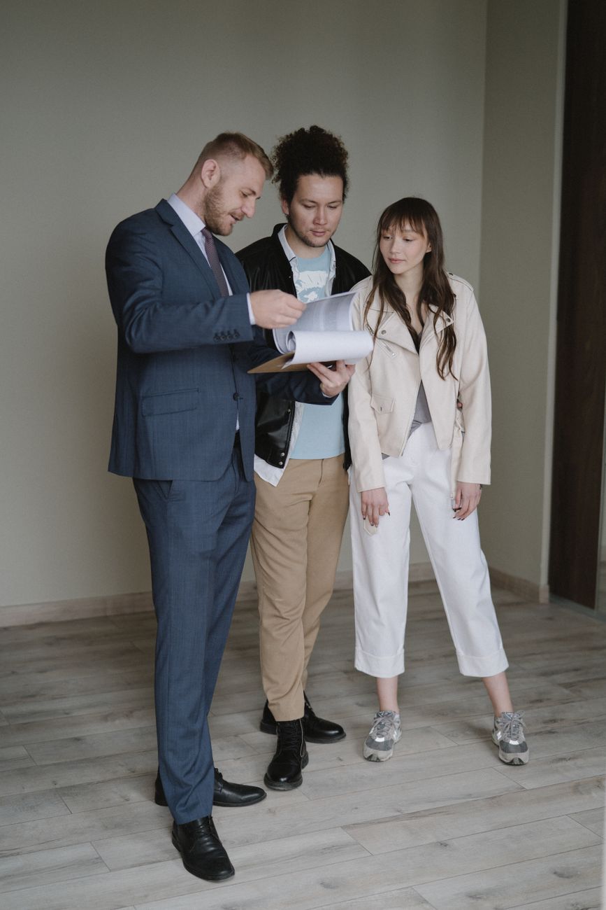 Swedish couple reviewing a property purchase in Marbella with a mortgage advisor