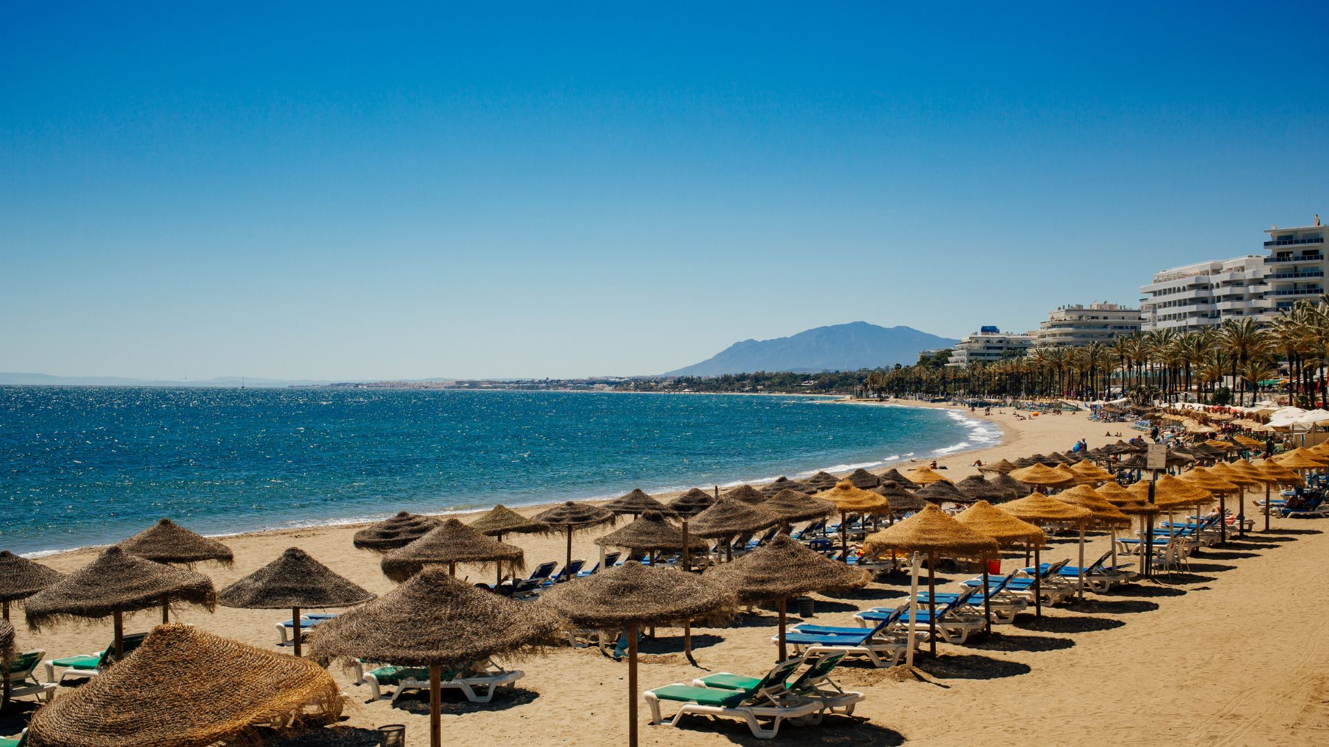 International buyers consulting a mortgage advisor on the Costa del Sol — mortgage for foreigners in Spain